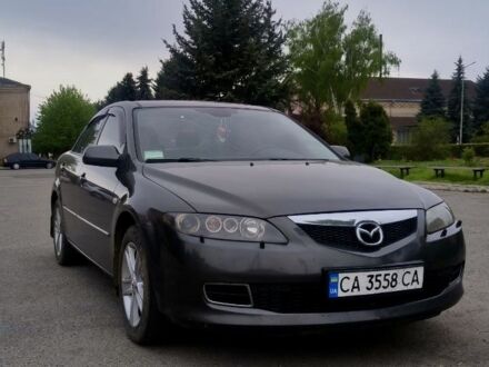 Серый Мазда 6, объемом двигателя 2 л и пробегом 195 тыс. км за 5800 $, фото 1 на Automoto.ua