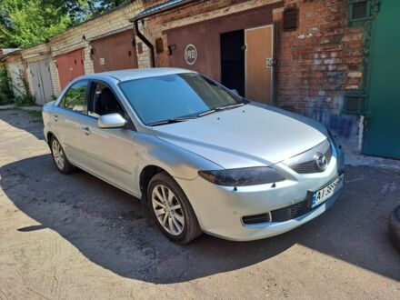 Серый Мазда 6, объемом двигателя 2 л и пробегом 282 тыс. км за 4200 $, фото 1 на Automoto.ua