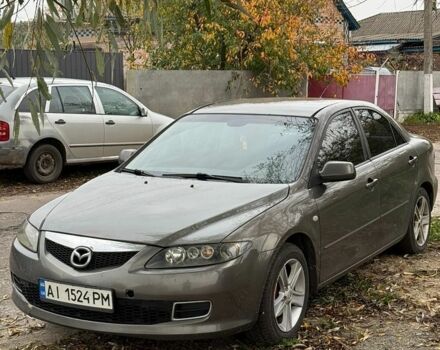 Сірий Мазда 6, об'ємом двигуна 2 л та пробігом 377 тис. км за 3599 $, фото 1 на Automoto.ua