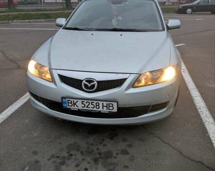 Серый Мазда 6, объемом двигателя 2 л и пробегом 234 тыс. км за 4600 $, фото 1 на Automoto.ua