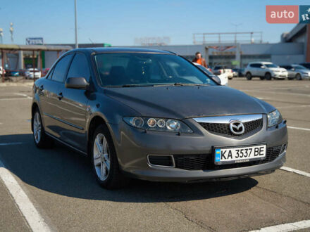 Серый Мазда 6, объемом двигателя 2 л и пробегом 345 тыс. км за 4500 $, фото 1 на Automoto.ua