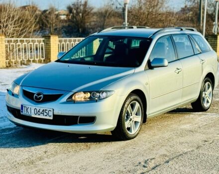 Серый Мазда 6, объемом двигателя 2 л и пробегом 295 тыс. км за 2750 $, фото 1 на Automoto.ua