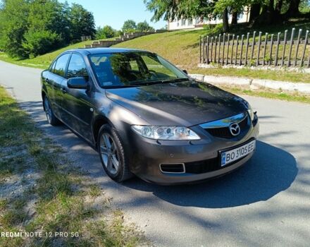 Серый Мазда 6, объемом двигателя 2 л и пробегом 250 тыс. км за 3600 $, фото 1 на Automoto.ua