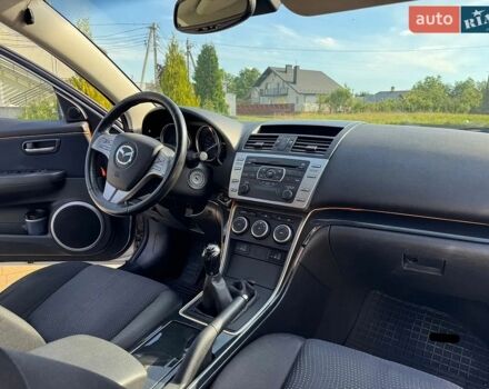 Серый Мазда 6, объемом двигателя 2 л и пробегом 189 тыс. км за 7000 $, фото 1 на Automoto.ua