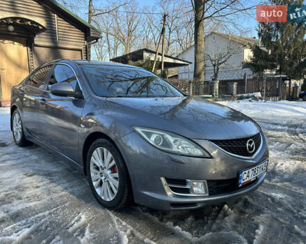 Серый Мазда 6, объемом двигателя 2 л и пробегом 252 тыс. км за 5600 $, фото 1 на Automoto.ua