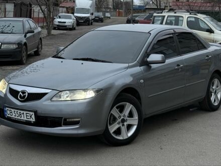 Серый Мазда 6, объемом двигателя 2 л и пробегом 323 тыс. км за 4750 $, фото 1 на Automoto.ua