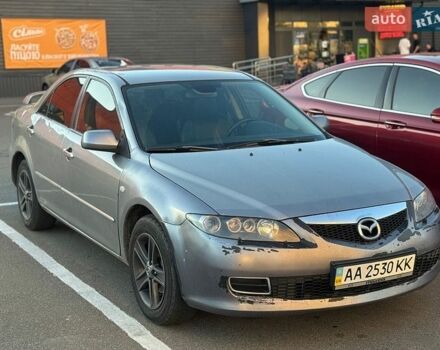 Серый Мазда 6, объемом двигателя 2 л и пробегом 293 тыс. км за 2850 $, фото 1 на Automoto.ua