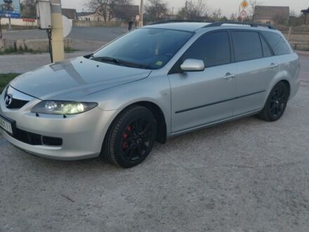 Серый Мазда 6, объемом двигателя 2 л и пробегом 252 тыс. км за 4700 $, фото 1 на Automoto.ua