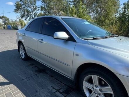 Серый Мазда 6, объемом двигателя 2 л и пробегом 280 тыс. км за 5200 $, фото 1 на Automoto.ua