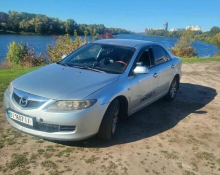 Серый Мазда 6, объемом двигателя 2 л и пробегом 350 тыс. км за 3010 $, фото 1 на Automoto.ua