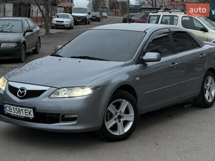 Серый Мазда 6, объемом двигателя 2 л и пробегом 323 тыс. км за 4750 $, фото 1 на Automoto.ua