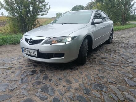 Серый Мазда 6, объемом двигателя 2.3 л и пробегом 227 тыс. км за 4600 $, фото 1 на Automoto.ua
