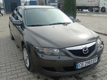 Сірий Мазда 6, об'ємом двигуна 2 л та пробігом 261 тис. км за 4000 $, фото 1 на Automoto.ua