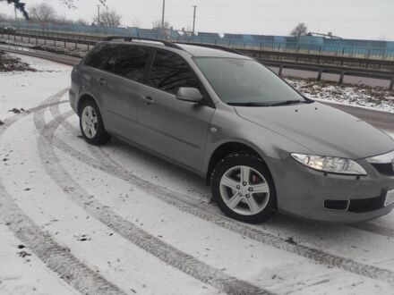 Серый Мазда 6, объемом двигателя 2 л и пробегом 306 тыс. км за 4500 $, фото 1 на Automoto.ua