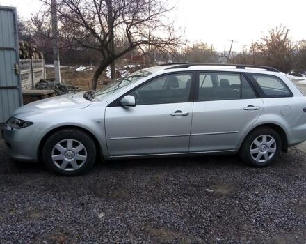 Сірий Мазда 6, об'ємом двигуна 2 л та пробігом 260 тис. км за 4900 $, фото 1 на Automoto.ua