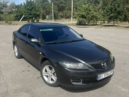 Серый Мазда 6, объемом двигателя 2 л и пробегом 455 тыс. км за 4680 $, фото 1 на Automoto.ua