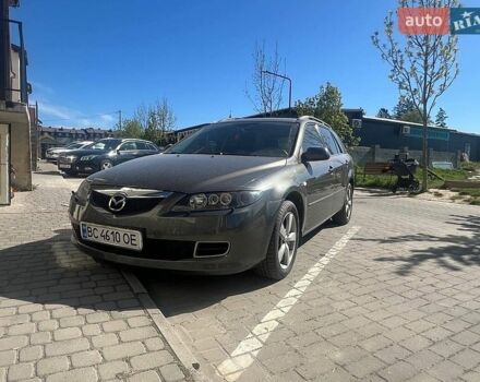 Серый Мазда 6, объемом двигателя 2 л и пробегом 250 тыс. км за 5400 $, фото 1 на Automoto.ua