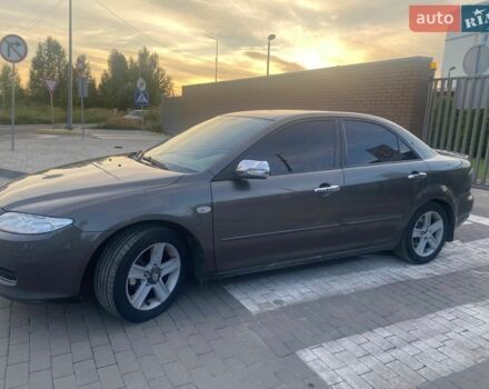 Серый Мазда 6, объемом двигателя 2 л и пробегом 358 тыс. км за 3900 $, фото 1 на Automoto.ua