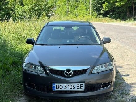 Серый Мазда 6, объемом двигателя 2 л и пробегом 253 тыс. км за 4100 $, фото 1 на Automoto.ua