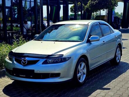 Серый Мазда 6, объемом двигателя 2 л и пробегом 187 тыс. км за 5350 $, фото 1 на Automoto.ua