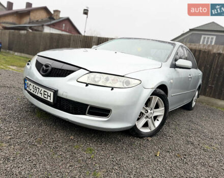 Серый Мазда 6, объемом двигателя 1.8 л и пробегом 256 тыс. км за 3999 $, фото 1 на Automoto.ua
