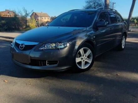 Серый Мазда 6, объемом двигателя 2 л и пробегом 200 тыс. км за 4900 $, фото 1 на Automoto.ua