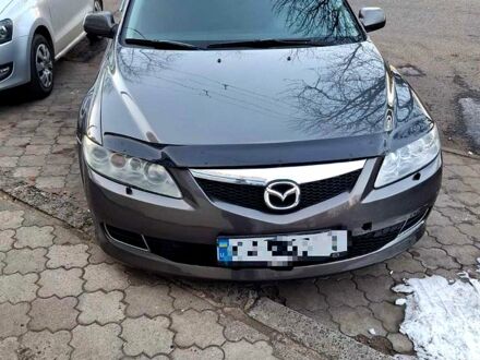 Серый Мазда 6, объемом двигателя 2 л и пробегом 200 тыс. км за 4500 $, фото 1 на Automoto.ua