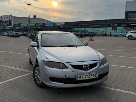 Серый Мазда 6, объемом двигателя 2 л и пробегом 383 тыс. км за 3900 $, фото 1 на Automoto.ua