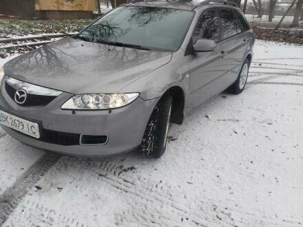 Серый Мазда 6, объемом двигателя 2 л и пробегом 306 тыс. км за 4500 $, фото 1 на Automoto.ua