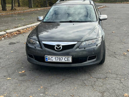 Серый Мазда 6, объемом двигателя 2 л и пробегом 306 тыс. км за 4240 $, фото 1 на Automoto.ua