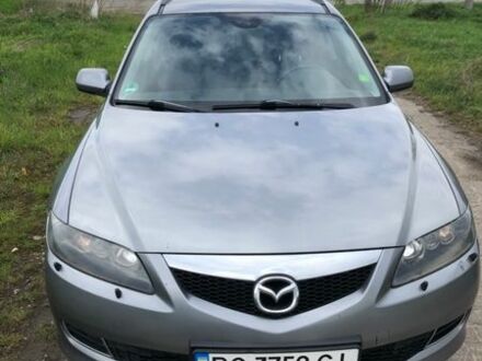 Серый Мазда 6, объемом двигателя 2 л и пробегом 237 тыс. км за 6704 $, фото 1 на Automoto.ua