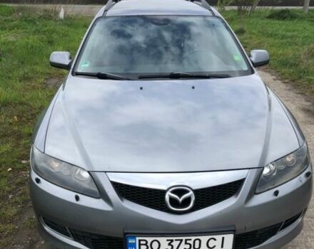 Серый Мазда 6, объемом двигателя 2 л и пробегом 237 тыс. км за 6704 $, фото 1 на Automoto.ua