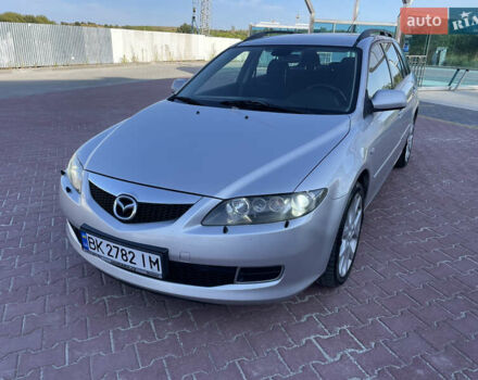 Серый Мазда 6, объемом двигателя 2 л и пробегом 257 тыс. км за 3750 $, фото 1 на Automoto.ua