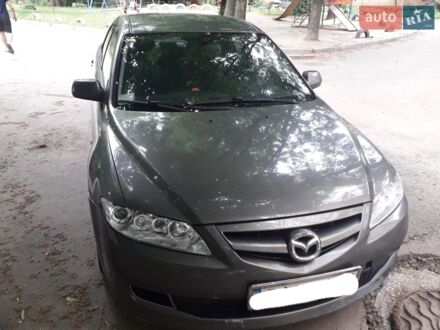 Серый Мазда 6, объемом двигателя 2 л и пробегом 275 тыс. км за 4200 $, фото 1 на Automoto.ua