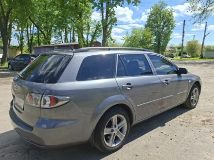 Серый Мазда 6, объемом двигателя 2 л и пробегом 250 тыс. км за 4636 $, фото 1 на Automoto.ua