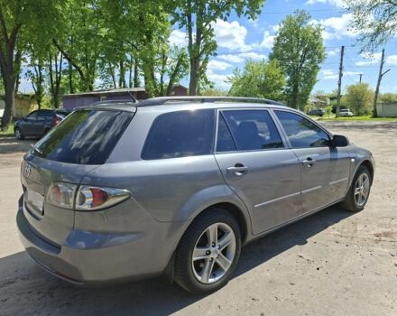 Серый Мазда 6, объемом двигателя 2 л и пробегом 250 тыс. км за 4636 $, фото 1 на Automoto.ua