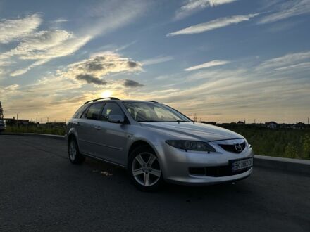 Серый Мазда 6, объемом двигателя 2 л и пробегом 325 тыс. км за 4350 $, фото 1 на Automoto.ua