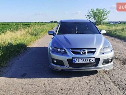 Серый Мазда 6, объемом двигателя 2.26 л и пробегом 245 тыс. км за 6050 $, фото 1 на Automoto.ua