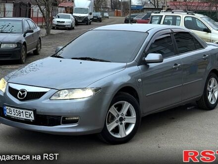 Серый Мазда 6, объемом двигателя 2 л и пробегом 323 тыс. км за 4750 $, фото 1 на Automoto.ua