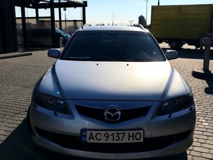 Серый Мазда 6, объемом двигателя 2 л и пробегом 265 тыс. км за 6150 $, фото 1 на Automoto.ua