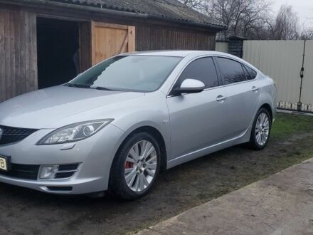 Серый Мазда 6, объемом двигателя 2 л и пробегом 215 тыс. км за 6500 $, фото 1 на Automoto.ua