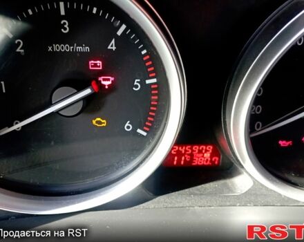 Сірий Мазда 6, об'ємом двигуна 2 л та пробігом 246 тис. км за 7600 $, фото 1 на Automoto.ua