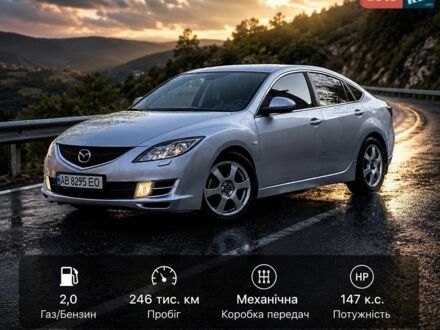 Серый Мазда 6, объемом двигателя 2 л и пробегом 246 тыс. км за 5700 $, фото 1 на Automoto.ua