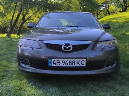 Серый Мазда 6, объемом двигателя 2 л и пробегом 240 тыс. км за 4600 $, фото 1 на Automoto.ua