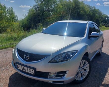 Серый Мазда 6, объемом двигателя 2 л и пробегом 265 тыс. км за 6300 $, фото 1 на Automoto.ua