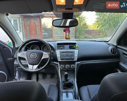 Серый Мазда 6, объемом двигателя 2 л и пробегом 250 тыс. км за 6300 $, фото 1 на Automoto.ua