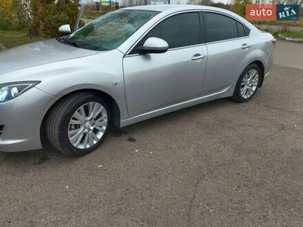 Серый Мазда 6, объемом двигателя 2 л и пробегом 256 тыс. км за 7100 $, фото 1 на Automoto.ua