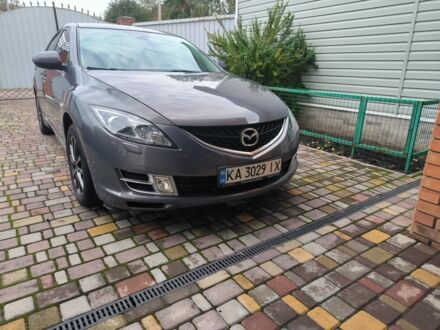 Серый Мазда 6, объемом двигателя 2 л и пробегом 212 тыс. км за 6500 $, фото 1 на Automoto.ua