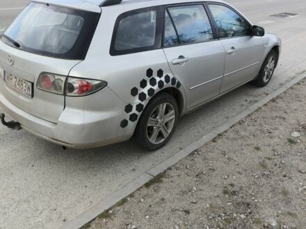 Серый Мазда 6, объемом двигателя 2 л и пробегом 278 тыс. км за 1750 $, фото 1 на Automoto.ua