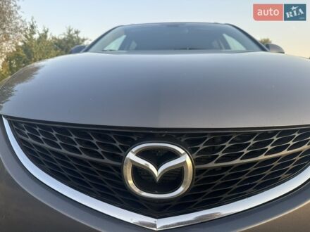 Серый Мазда 6, объемом двигателя 2 л и пробегом 245 тыс. км за 6800 $, фото 1 на Automoto.ua